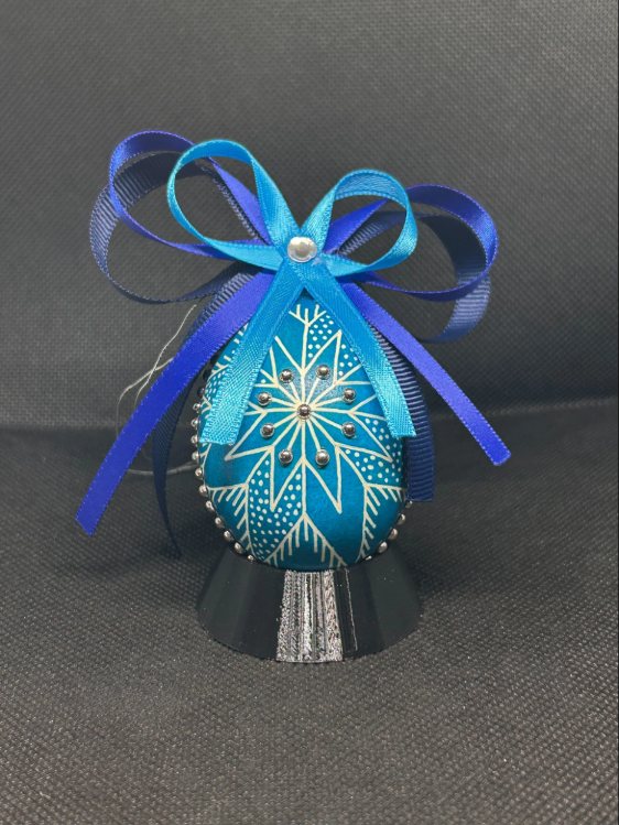 Christmas Sapphire pysanka, star design — sapphire egg with a white eight-point star